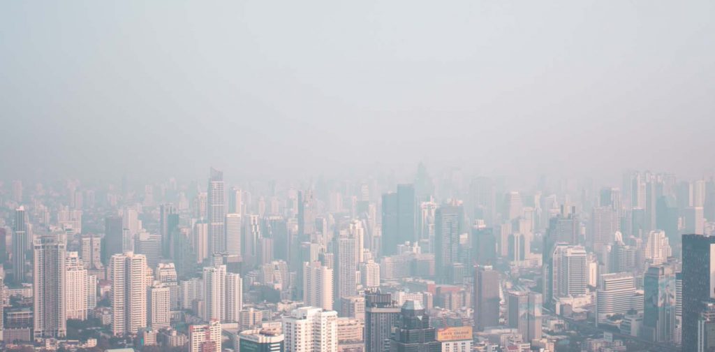 Bangkok city skyline with obscured with smog