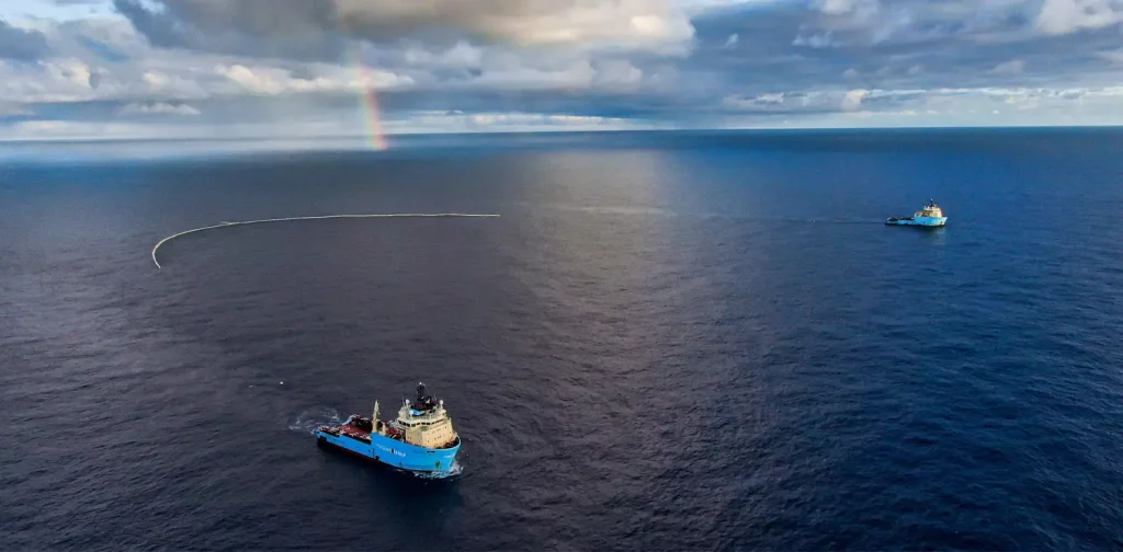 two ships of system 002 by the ocean cleanup at the sea