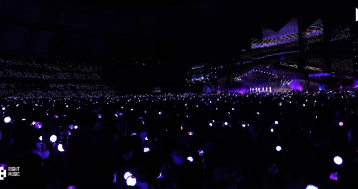 a crowd at a stadium concert